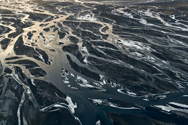 Braided glacier river delta patterns in iceland Kirkjubæjarklaustur, Skaftárhreppur, Iceland CR_OSBJ260127-1947190-01