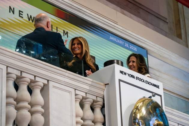 January 28, 2026, New York, New York, USA: First Lady MELANIA TRUMP high fives Chairperson of Intercontinental Exchange JEFFREY C. SPRECHER after ringing the New York Stock Exchange bell. New York USA - ZUMAs365 20260128_znp_s365_002 Copyright: xJoeyxSussmanx
