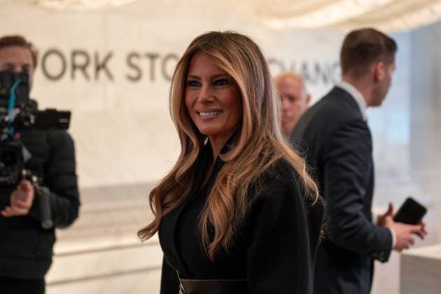 January 28, 2026, New York, New York, USA: First Lady MELANIA TRUMP smiles as she walks upstairs to the New York Stock Exchange bell. New York USA - ZUMAs365 20260128_znp_s365_004 Copyright: xJoeyxSussmanx