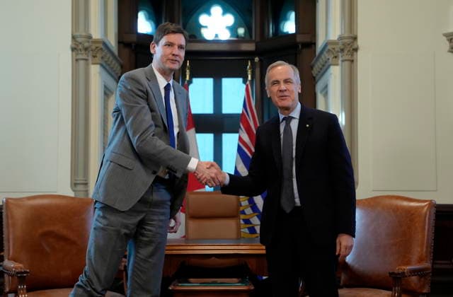 January 28, 2026, Ottawa, On, Canada: Prime Minister Mark Carney, right, shakes hands with B.C. Premier David Eby at the start of a meeting in the prime minister s office in Ottawa, Wednesday, Jan. 28, 2026. Ottawa Canada  - ZUMAc35_ 20260128_zaf_c35_069 Copyright: xAdrianxWyldx