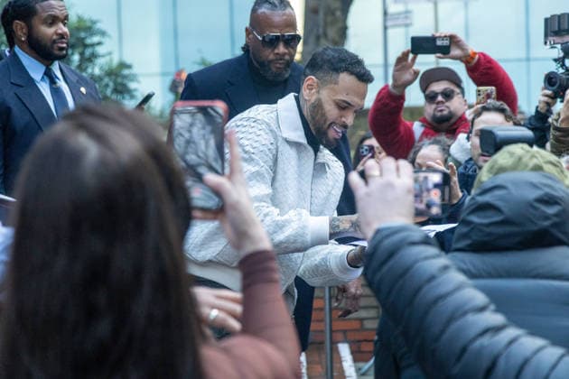 January 28, 2026, London, England, United Kingdom: R&B singer CHRIS BROWN leaves Southwark Crown Court, south London, where he is charged over an alleged assault in a London nightclub. The American musician, 36, is accused of causing grievous bodily harm to Abraham Diaw in February 2023 London United Kingdom - ZUMAs262 20260128_zip_s262_010 Copyright: xTayfunxSalcix