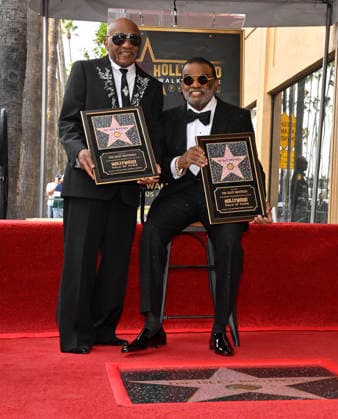 Singer-songwriters Ernie Isley (L) and Ronald Isley of the US band The Isley Brothers hold replica plaques during an unveiling ceremony honoring the band with the 2,834th star on the Hollywood Walk of Fame in Los Angeles on Wednesday, January 28, 2026.  LAP2026012801 JIMxRUYMEN
