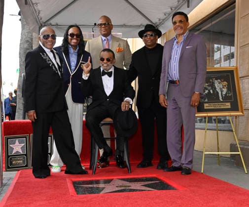 L-R) Ernie Isley, Verdine White, Jon Platt, Chairman & CEO, Sony Music Publishing, Ronald Isley, Terry Lewis and Judge Greg Mathis attend an unveiling ceremony honoring the band with the 2,834th star on the Hollywood Walk of Fame in Los Angeles on Wednesday, January 28, 2026.  LAP2026012813 JIMxRUYMEN