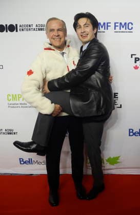 January 29, 2026, Ottawa, On, Canada: Prime Minister Mark Carney poses for a photo on the red carpet with Hudson Williams, star of the TV series Heated Rivalry at the Prime Time screen and media industry conference gala in Ottawa, on Thursday, January 29, 2026. Ottawa Canada  - ZUMAc35_ 20260129_zaf_c35_192 Copyright: xPatrickxDoylex