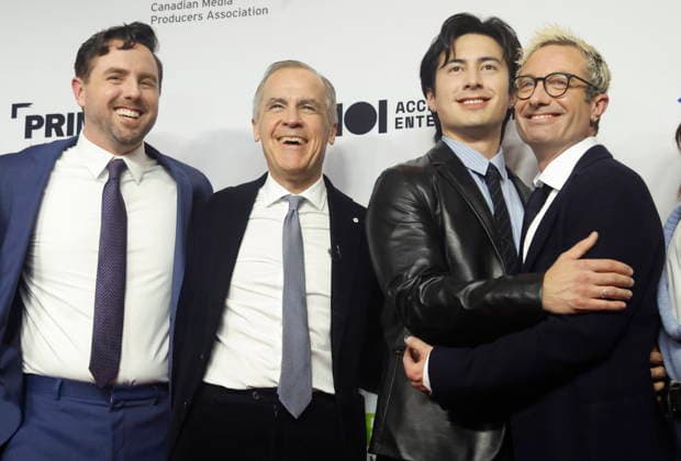January 29, 2026, Ottawa, On, Canada: Prime Minister Mark Carney poses for a photo on the red carpet with, left to right, Brendan Brady, co-creator of the TV series Heated Rivalry , Hudson Williams, series star, and co-creator Jacob Tierney at the Prime Time screen and media industry conference gala in Ottawa, on Thursday, January 29, 2026. Ottawa Canada  - ZUMAc35_ 20260129_zaf_c35_205 Copyright: xPatrickxDoylex