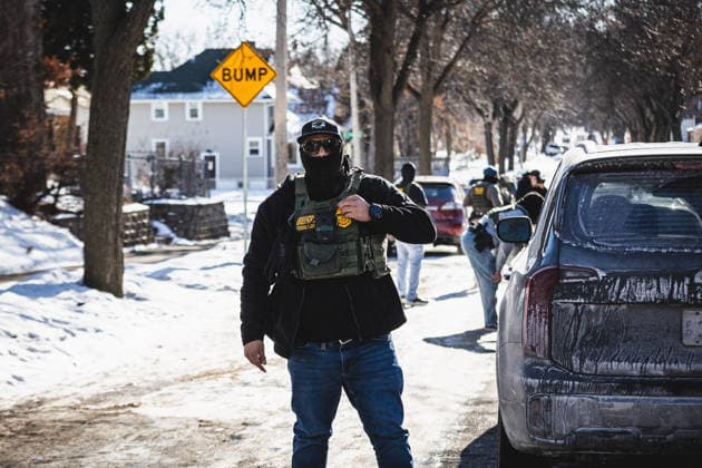 January 29, 2026, Minneapolis, Minnesota, USA: US Customs and Border Patrol agents warn a convoy of observors they follow as part of the OPERATION METRO SURGE immigration crackdown in St. Paul, Minnesota. Minneapolis USA - ZUMAd256 20260129_znp_d256_017 Copyright: xDavexDeckerx