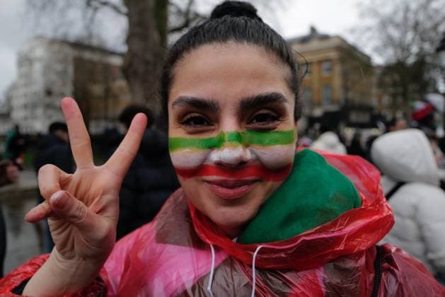 Iranian diaspora rally against the Iranian regime in London Iranian monarchists congregate to express allegiance to Prince Reza Pahlavi and the restoration of the Pahlavi dynasty. The event features prominent displays of the pre-revolutionary Lion and Sun flag and portraits of the former royal family. Demonstrators express their loyalty through public displays of devotion, including some individuals receiving tattoos of the Shah™s signature, as they advocate for a secular parliamentary monarchy in Iran. London England United Kingdom Copyright: xJoaoxDanielxPereirax