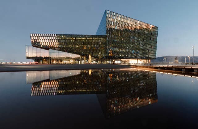 Creative Highlights World Harpa concert hall reflected in still water, Rekjavik, Iceland Reykjavík, Reykjavíkurborg, Iceland CR_SSNF260201C-1943158-01 EDITORIAL USE ONLY