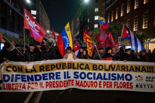 February 3, 2026, Rome, Rm, Italy: One month after the attack by US military forces in Venezuela and the arrest of Nicolas Maduro, students and activists gather near the US embassy to reiterate their condemnation of the attack, to demand the release of Maduro and his wife Flores, as well as justice for the 32 Cubans who died defending the former president. With the Bolivarian Republic! Defend socialism. Freedom for President Maduro and Flores reads the banner. Rome Italy - ZUMAg256 20260203_znp_g256_009 Copyright: xMarcoxDixGianvitox