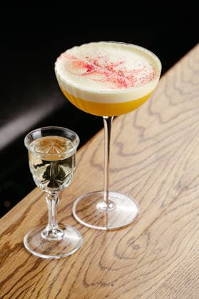 alcoholic cocktail with foam in a beautiful glass R_KUAL260202-1905369-01