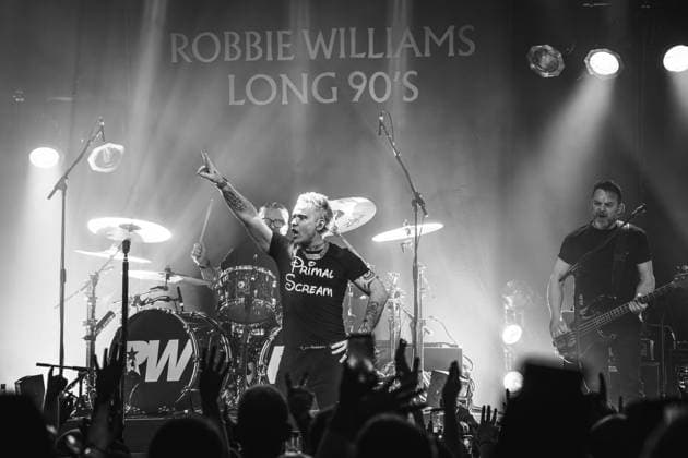 Robbie Williams performing at Barrowlands in Glasgow on 04 February 2026. Robbie Williams performing at Barrowlands in Glasgow on 04 February 2026 as part of his Long 90™s tour performing ˜Life Thru a Lens™ and new album ˜Britpop™ in full. Robbie Williams is a British singer and songwriter best known for solo singles ˜Angels™ and ˜Feel™ and as a member of the pop group Take That., Credit:Adam Hampton-Matthews Avalon  Copyright: xAdamxHampton-Matthewsx xAvalonx 1072124394