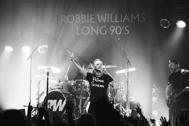 Robbie Williams performing at Barrowlands in Glasgow on 04 February 2026. Robbie Williams performing at Barrowlands in Glasgow on 04 February 2026 as part of his Long 90™s tour performing ˜Life Thru a Lens™ and new album ˜Britpop™ in full. Robbie Williams is a British singer and songwriter best known for solo singles ˜Angels™ and ˜Feel™ and as a member of the pop group Take That., Credit:Adam Hampton-Matthews Avalon  Copyright: xAdamxHampton-Matthewsx xAvalonx 1072124424