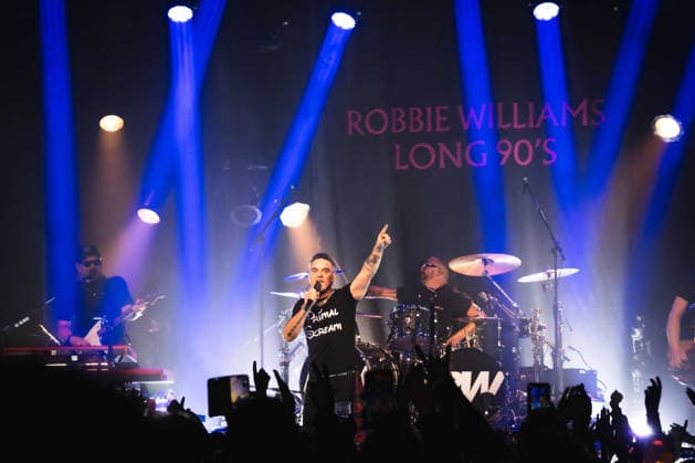 Robbie Williams performing at Barrowlands in Glasgow on 04 February 2026. Robbie Williams performing at Barrowlands in Glasgow on 04 February 2026 as part of his Long 90™s tour performing ˜Life Thru a Lens™ and new album ˜Britpop™ in full. Robbie Williams is a British singer and songwriter best known for solo singles ˜Angels™ and ˜Feel™ and as a member of the pop group Take That., Credit:Adam Hampton-Matthews Avalon  Copyright: xAdamxHampton-Matthewsx xAvalonx 1072125074