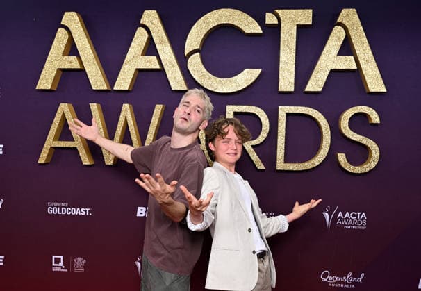 AACTA AWARDS 2026, Danny Philippou (left) and Jonah Wren Phillips (right) are seen posing for a photo on the red carpet at the 2024 AACTA Awards at HOTA in Surfers Paradise, Queensland, Friday, February 6, 2026. ( NO ARCHIVING BRISBANE QUEENSLAND AUSTRALIA  Copyright: xDARRENxENGLANDx 20260206146498942564
