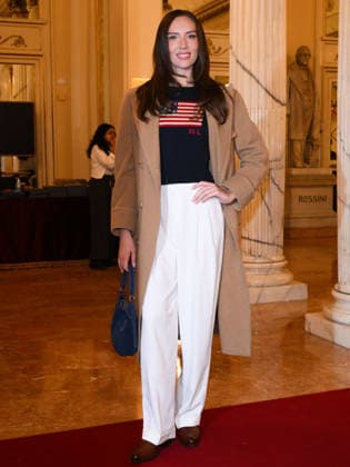Milan, Milan Cortina 2026 Olympic Games, Welcome cocktail for guests at the Opening Ceremony at Teatro alla Scala. Pictured: Sydney Lee Carlson  Copyright: xAlbertoxTerenghix xipa-agency.netx xComi Terenghix IPA_Agency_IPA71038516