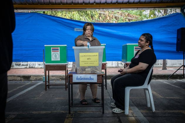 February 8, 2026, Bangkok, Thailand: Voter seen casting her vote at the polling station. Thailand is holding a snap general election today to elect the 500 members of the House of Representatives, following the dissolution of parliament late last year amid political instability and a border conflict with Cambodia..Polling stations opened this morning, with over 53 million eligible voters choosing among more than 50 parties. Bangkok Thailand - ZUMAs197 20260208_aaa_s197_013 Copyright: xGuillaumexPayenx