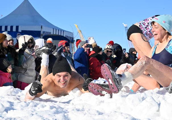 February 8, 2026, Quebec, Pq, Canada: Snow bathers roll in the snow during the annual snow bath at the Quebec winter carnival in Quebec City Sunday, Feb. 8, 2026. Quebec Canada  - ZUMAc35_ 20260208_zaf_c35_213 Copyright: xJacquesxBoissinotx