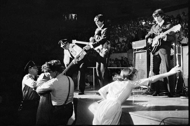 RECORD DATE NOT STATED The Beatles Paul McCartney and George Harrison performing live at a concert 1964 EDITORIAL USE ONLY  Copyright: xGuntherx