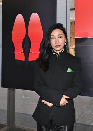 Milan, Italy The Luxury Icons inauguration and presentation at the MonteNapoleone District the initiative included in the program of the Cultural Olympics of Milan Cortina 2026 In the photo: Chen Man photographs the exhibition  Copyright: xNickxZonnax xipa-agency.netx xNickxZonnax IPA_Agency_IPA71223164