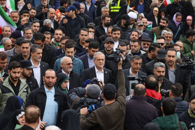 February 11, 2026, Tehran, Iran: Iranian President MASOUD PEZESHKIAN (C) takes part in a celebration marking the 47th anniversary of the Islamic Revolution in Tehran. This anniversary commemorates the 1979 revolution, during which the monarchy was overthrown and replaced by the Islamic Republic of Iran, with Ayatollah Ruhollah Khomeini as its first Supreme Leader. Tehran Iran - ZUMAi98_ 20260211_zih_i98_003 Copyright: xIranianxPresidencyx