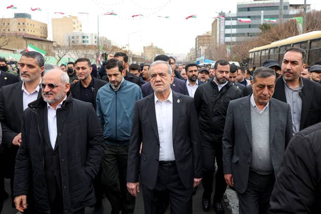 February 11, 2026, Tehran, Iran: Iranian President MASOUD PEZESHKIAN (C) takes part in a celebration marking the 47th anniversary of the Islamic Revolution in Tehran. This anniversary commemorates the 1979 revolution, during which the monarchy was overthrown and replaced by the Islamic Republic of Iran, with Ayatollah Ruhollah Khomeini as its first Supreme Leader. Tehran Iran - ZUMAi98_ 20260211_zih_i98_009 Copyright: xIranianxPresidencyx