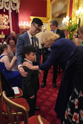 Queen Camilla hosts The Amber Trust reception Queen Camilla speaks to Sam Tsang and his son Evan Tsang, following a musical performance to celebrate 30 years of The Amber Trust, which provides musical opportunities for blind and partially sighted children, including children with more complex needs, at St James Palace, London. Picture date: Tuesday February 10, 2026., Credit:Yui Mok Avalon UK, London  Copyright: xYuixMokx xAvalonx 1073948658