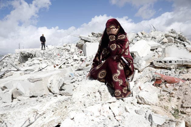 Israeli forces demolish a Palestinian home in West Bank HEBRON, WEST BANK - FEBRUARY 11: Palestinian woman sits on the debris after Israeli army demolishes a Palestinian home claiming it is unlicensed in the village of Beit Awwa near Hebron, West Bank on February 11, 2026. Mamoun Wazwaz Anadolu Hebron West Bank. Editorial use only. Please get in touch for any other usage.  Copyright: x2026xAnadoluxMamounxWazwazx