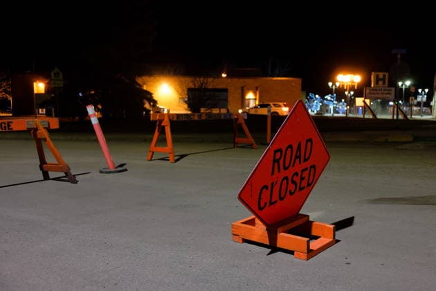 February 11, 2026, Tumbler Ridge, Bc, CANADA: The road is blocked off before the Tumbler Ridge Secondary School in Tumbler Ridge, B.C. on Wednesday, Feb. 11, 2026. Tumbler Ridge CANADA  - ZUMAc35_ 20260211_zaf_c35_047 Copyright: xJessexBoilyx
