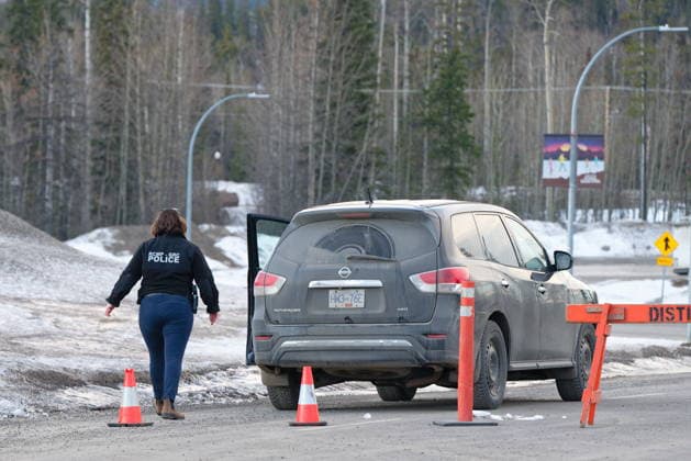 February 11, 2026, Tumbler Ridge, Bc, Canada: Police could be seen leaving and going to the Tumbler Ridge Secondary School throughout the morning in Tumbler Ridge, B.C. on Wednesday, Feb. 11, 2026. Tumbler Ridge Canada  - ZUMAc35_ 20260211_zaf_c35_097 Copyright: xJessexBoilyx