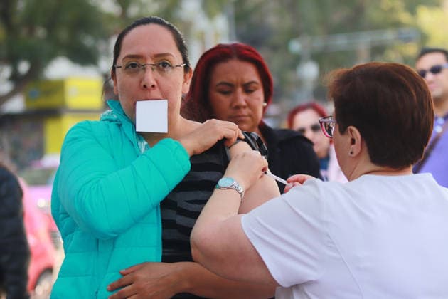 A nurse administers a dose of the measles vaccine to a woman at Bellas Artes vaccination center, as part the vaccination campaign against the virus outbreak after increase measles cases in the country, on February 11, 2026, in Mexico City, Mexico. Mexico City Mexico - ZUMAe321 20260211_zia_e321_040 Copyright: xCarlosxSantiagox