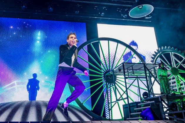 February 11, 2026, Manchester, United Kingdom: Mika (MICHAEL HOLBROOK PENNIMAN JR) performs on stage at the AO Arena, Manchester, UK, during his Spinning Out tour, delivering a flamboyant, high-energy set to a packed arena crowd. Manchester United Kingdom  - ZUMAp211 20260211_aap_p211_011 Copyright: xAndyxVonxPipx