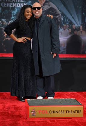 Tiffany Haddish (L) and Jo Koy attend a hand and footprint ceremony honoring Koy in the forecourt of the TCL Chinese Theatre in Los Angeles, California on Wednesday, February 11, 2026.  LAP20260211716 CHRISxCHEW