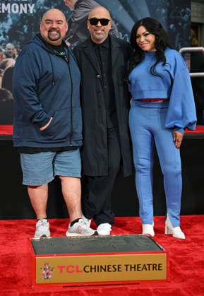 (L-R) Gabriel Iglesias, Jo Koy and Tisha Campbell attend a hand and footprint ceremony honoring Koy in the forecourt of the TCL Chinese Theatre in Los Angeles, California on Wednesday, February 11, 2026.  LAP20260211722 CHRISxCHEW