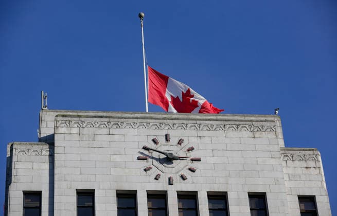 (260212) -- VANCOUVER, Feb. 12, 2026 -- The Canadian national flag flies at half-mast over Vancouver City Hall in Vancouver, British Columbia, Canada, Feb. 11, 2026. Canadian Prime Minister Mark Carney on Wednesday ordered all flags on Parliament Hill and federal buildings across Canada to be flown at half-mast for seven days as the country mourns the victims of a mass shooting in Tumbler Ridge, British Columbia province. The shooting claimed 10 lives, including the shooter, making it one of the deadliest mass shootings in Canadian history. (Photo by Xinhua) CANADA-VANCOUVER-MASS SHOOTING-FLAGS-HALF-MAST LiangxSen 