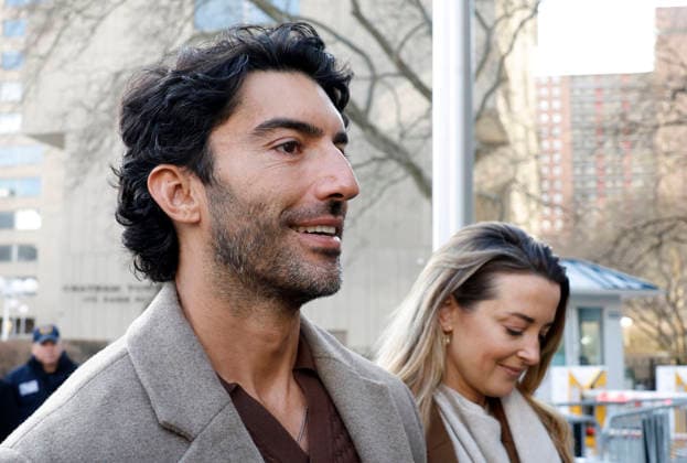 Justin Baldoni arrives at U.S. District Court in Manhattan with Emily Baldoni regarding his case against Jonesworks PR boss Stephanie Jones, whom he sued in March 2025. on Thursday, February 12, 2026 in New York City. Justin Baldoni and Jennifer Abel have filed a lawsuit against publicist Stephanie Jones as part of the ongoing legal battle between the It Ends With Us director and cast member Blake Lively.  NYP20260212103 JOHNxANGELILLO