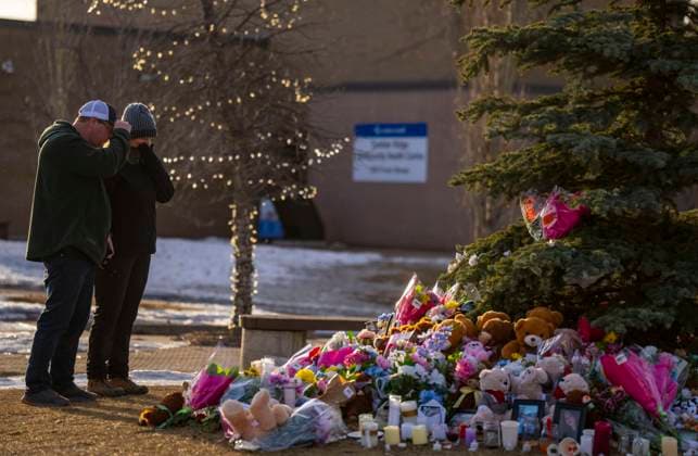February 12, 2026, Tumbler Ridge, Bc, CANADA: People pay their respects by a memorial for the victims of a mass shooting in Tumbler Ridge, B.C., on Thursday, Feb. 12, 2026. Tumbler Ridge CANADA  - ZUMAc35_ 20260212_zaf_c35_204 Copyright: xChristinnexMuschix