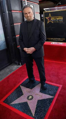 Italian actor Franco Nero stands on his star during an unveiling ceremony honoring him with the 2,835th star on the Hollywood Walk of Fame in Los Angeles on Thursday, February 12, 2026.  LAP2026021209 JIMxRUYMEN