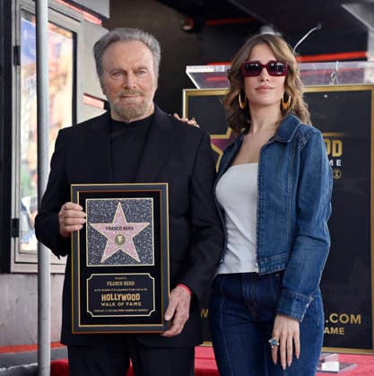 Italian actor Franco Nero is joined by Clara Soccini during an unveiling ceremony honoring him with the 2,835th star on the Hollywood Walk of Fame in Los Angeles on Thursday, February 12, 2026.  LAP2026021212 JIMxRUYMEN