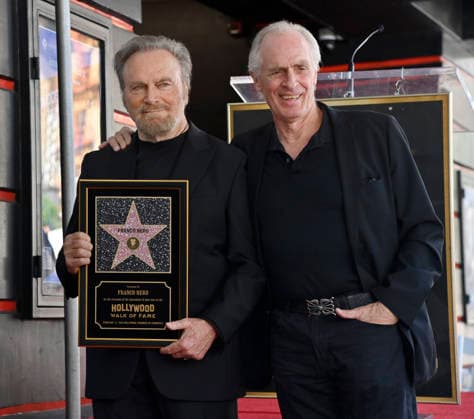 Italian actor Franco Nero is joined by US actor Keith Carradine during an unveiling ceremony honoring him with the 2,835th star on the Hollywood Walk of Fame in Los Angeles on Thursday, February 12, 2026.  LAP2026021205 JIMxRUYMEN
