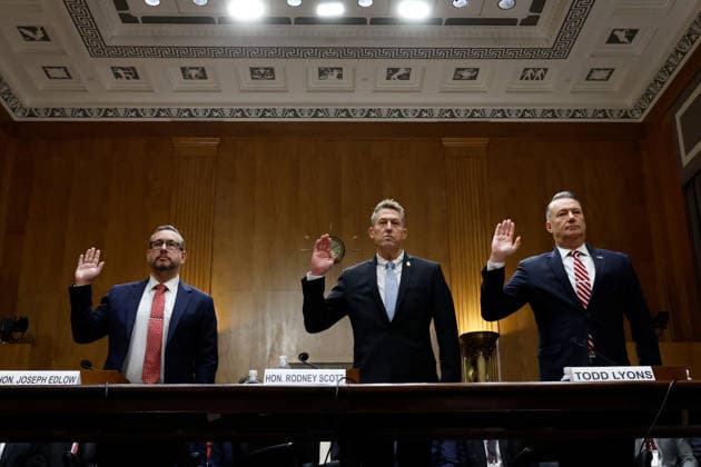 February 12, 2026, Washington, District Of Columbia, USA: Left to right: Director of U.S. Citizenship and Immigration Services (USCIS) Joseph Edlow, U.S. Customs and Border Protection (CBP) Commissioner Rodney Scott, and Acting Director of U.S. Immigration and Customs Enforcement (ICE) Todd Lyons are sworn in to testify during a hearing on oversight of the Department of Homeland Security before the Senate Homeland Security and Governmental Affairs Committee in the Dirksen Senate Office Building on February 12, 2026 in Washington, DC. The Department of Homeland Security has faced criticism over law enforcement tactics targeting undocumented immigrants and the killing of two U.S. citizens in Minneapolis Washington USA  - ZUMAs152 20260212_faa_s152_013 Copyright: xChipxSomodevillax-xPoolxviaxCNPx