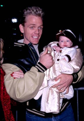 RECORD DATE NOT STATED Christopher Titus attends the Hollywood Christmas Parade with his new born daughter in Hollywood Ca. 11 25 01 EDITORIAL USE ONLY  Copyright: x