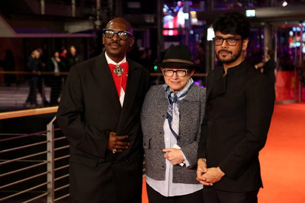 February 12, 2026, Berlin, Germany: (L-R) Lemohang Jeremiah Mosese, B Ruby Rich and Shaunak Sen pose on the red carpet at the opening ceremony of the 76th Berlin International Film Festival (Berlinale), which is Europe s first major film festival of the year, in Berlin. The festival runs from February 12 to 22, 2026. Berlin Germany - ZUMAf146 20260212_zip_f146_202 Copyright: xRouzbehxFouladix