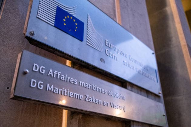 BELGIUM BRUSSELS EUROPEAN COMMISSION MARITIME AFFAIRS SIGN Close up view of a metal sign with the European Union flag and the text European Commission and DG Affaires maritimes et peche DG Maritieme Zaken en Visserij at the entrance of a European Commission building in Brussels in Brussels Capital Region in Belgium on December 9, 2024 The image focuses on European Union institutions and maritime policy through the bilingual plaque fixed to the stone wall Vue rapprochee de une plaque metallique avec le drapeau de lUnion europeenne et les textes European Commission et DG Affaires maritimes et peche DG Maritieme Zaken en Visserij at the entrance to a European Commission building in Brussels in the Brussels Capital Region of Belgium on Decembe 