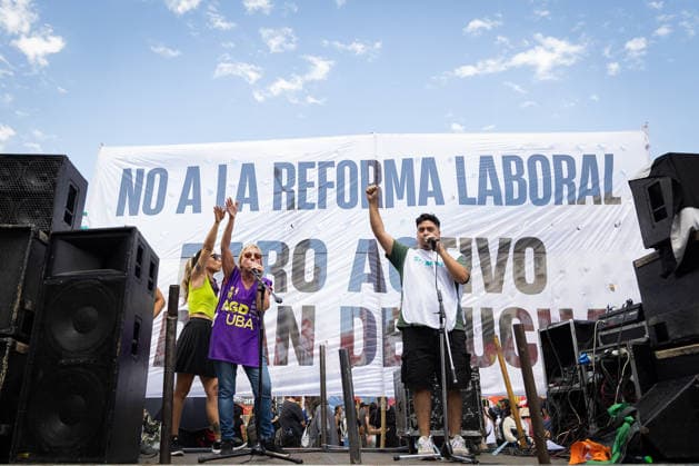 February 11, 2026, Buenos Aires, Buenos Aires, Argentina: Union leaders sing on stage during the march against labor reform outside the National Congress Buenos Aires Argentina - ZUMAp265 20260211_zip_p265_006 Copyright: xDelfinaxCorberaxPix