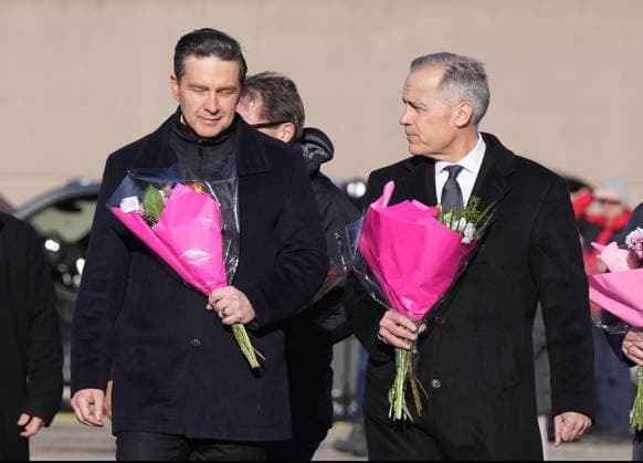 February 13, 2026, Tumbler Ridge, Bc, CANADA: Prime Minister Mark Carney, right, and Conservative Leader Pierre Poilievre arrive at a memorial for the victims of a mass shooting, in Tumbler Ridge, B.C., Friday, Feb. 13, 2026. Tumbler Ridge CANADA - ZUMAc35_ 20260213_zaf_c35_113 Copyright: xChristinnexMuschix
