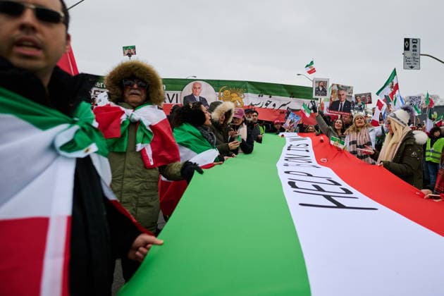 February 14, 2026, Toronto, On, Canada: Protesters march in support of regime change in Iran during a demonstration in Toronto, on Saturday, Feb. 14, 2026. Toronto Canada  - ZUMAc35_ 20260214_zaf_c35_098 Copyright: xSammyxKoganx