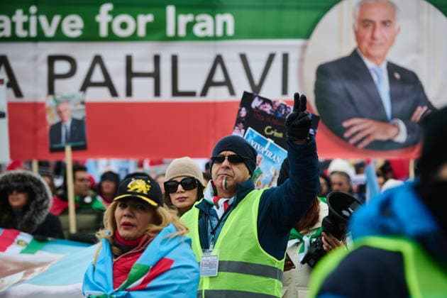 February 14, 2026, Toronto, On, Canada: Protesters march in support of regime change in Iran during a demonstration in Toronto, on Saturday, Feb. 14, 2026. Toronto Canada  - ZUMAc35_ 20260214_zaf_c35_099 Copyright: xSammyxKoganx