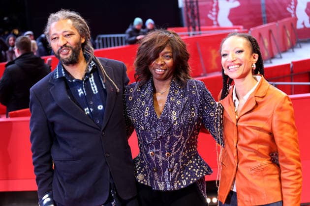 February 14, 2026, Berlin, Germany: (L-R) French-Senegalese director Alain Gomis, French actress Katy Correa and French actress DÃ¢â‚¬â ¢Joho Kouadio attend the red carpet for the film Dao premiere during the 76th Berlin International Film Festival (Berlinale), which is Europe s first major film festival of the year, in Berlin. The festival runs from February 12 to 22, 2026. Berlin Germany - ZUMAf146 20260214_zip_f146_110 Copyright: xRouzbehxFouladix