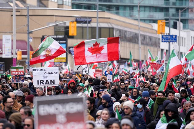 Thousands march in Toronto in support of regime change in Iran TORONTO, CANADA - FEBRUARY 14 : Thousands of protestors attend a rally at Yonge Street against Iranian regime on February 14, 2026 in Toronto, Ontario, Canada. Toronto Police warned of ‘extreme traffic and transit delays with attendance of as many as 200,000 people . Protesters waving flags and chanting slogans in solidarity with the Iranian people, marched along Yonge Street in North York within ‘Global Day of Action’. Mert Alper Dervis Anadolu Ontario Canada. Editorial use only. Please get in touch for any other usage.  Copyright: x2026xAnadoluxMertxAlperxDervisx