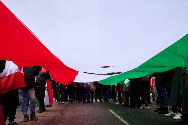 February 14, 2026, Toronto, On, Canada: Protesters march in support of regime change in Iran during a demonstration in Toronto, on Saturday, Feb. 14, 2026. Toronto Canada  - ZUMAc35_ 20260214_zaf_c35_213 Copyright: xSammyxKoganx